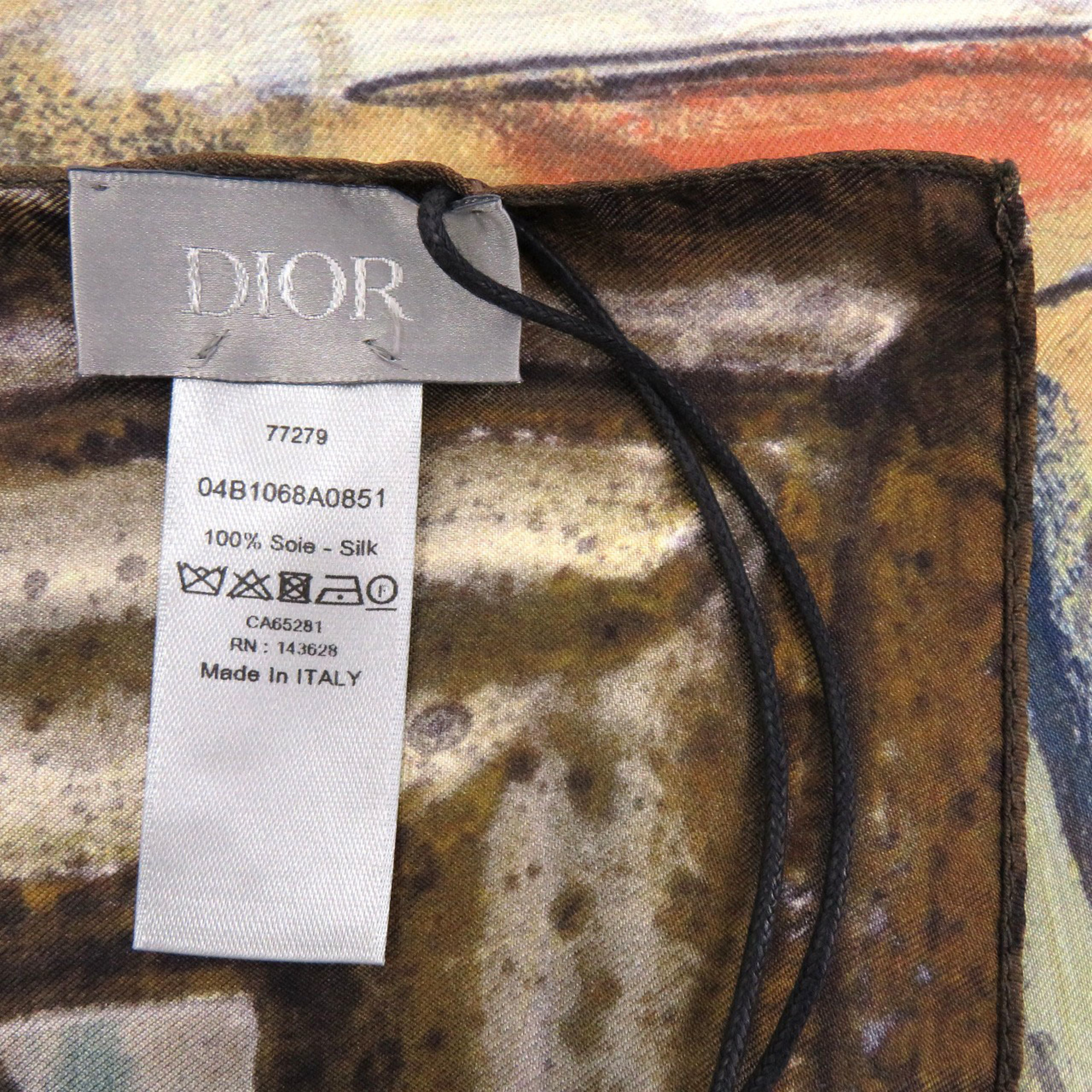 Christian Dior Like new Dior silk scarf in brown, green, and yellow. 0671