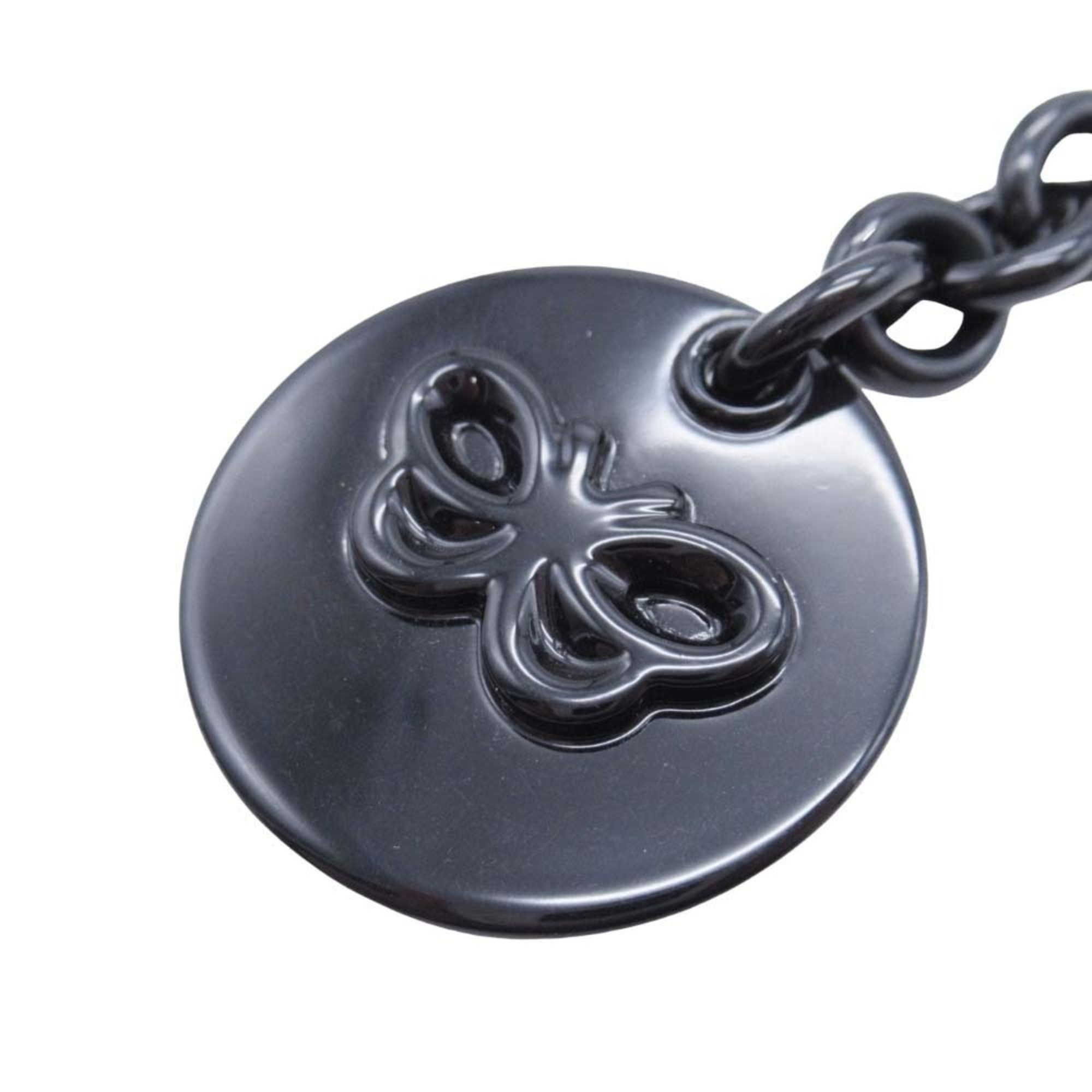 BOTTEGA VENETA Bottega Veneta metal chain belt with logo, papillon, and coin motif in black for men women.