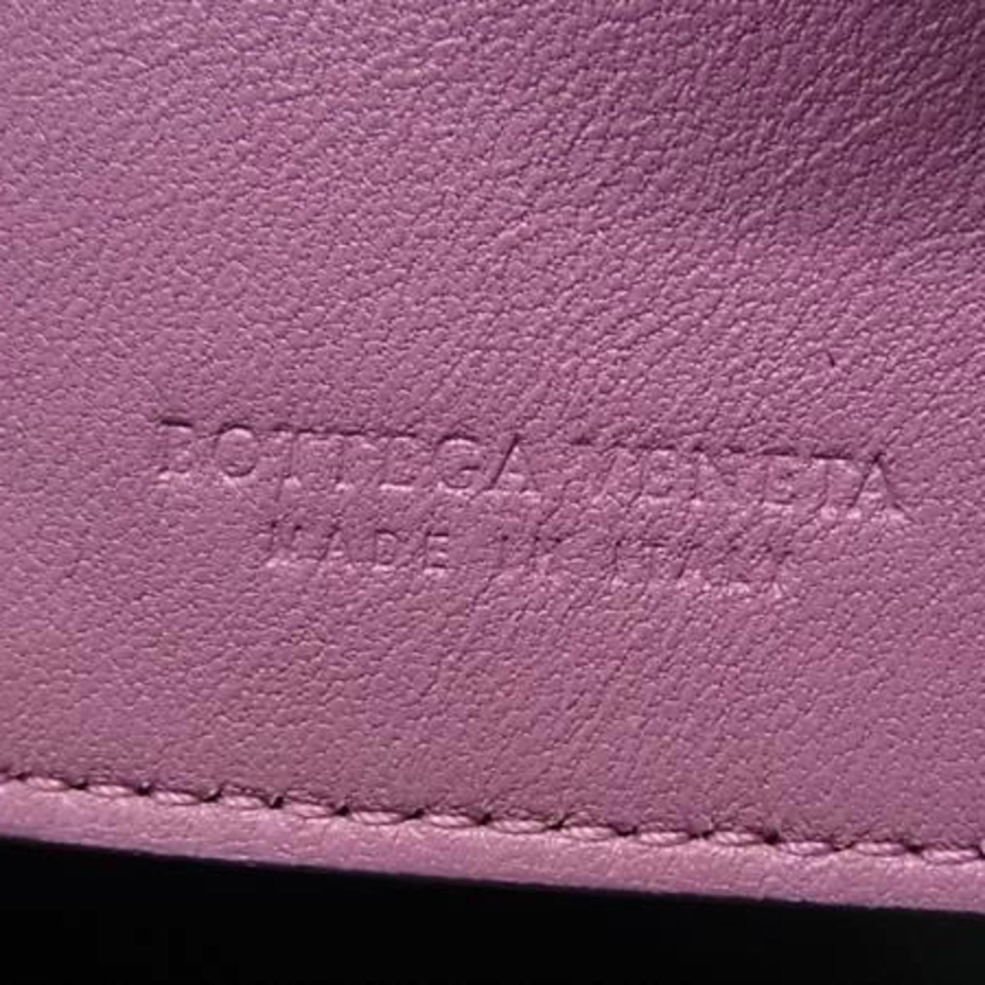 BOTTEGA VENETA 6-ring key case in pink-purple leather with intrecciato detailing.